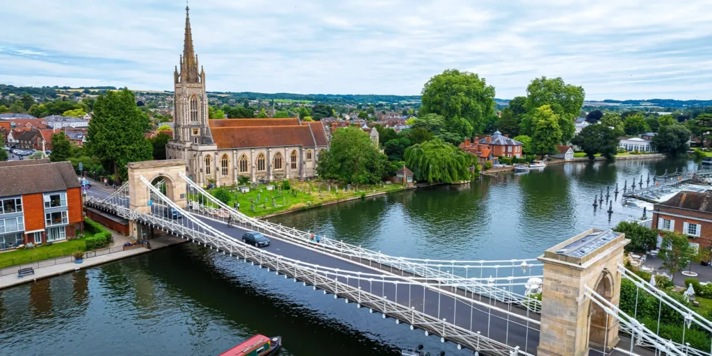 Marlow suspension bridge and All Saints Church over the River Thames — Primokleen carpet cleaning Marlow